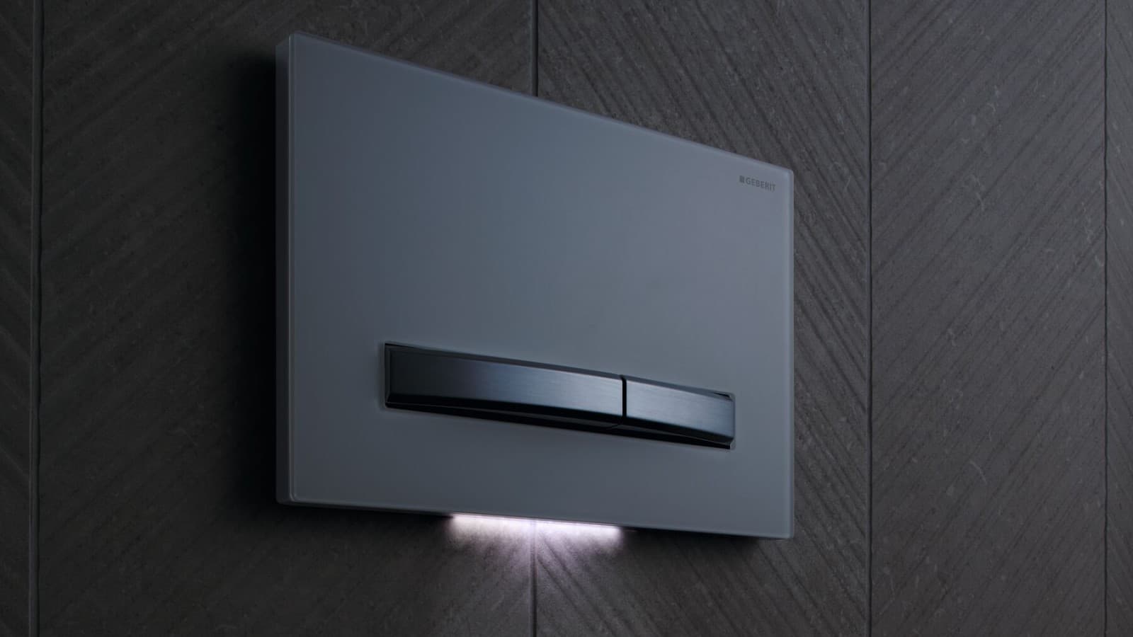 Geberit Sigma50 in bianco con luce di cortesia Geberit Sigma50 in bianco con luce di cortesia